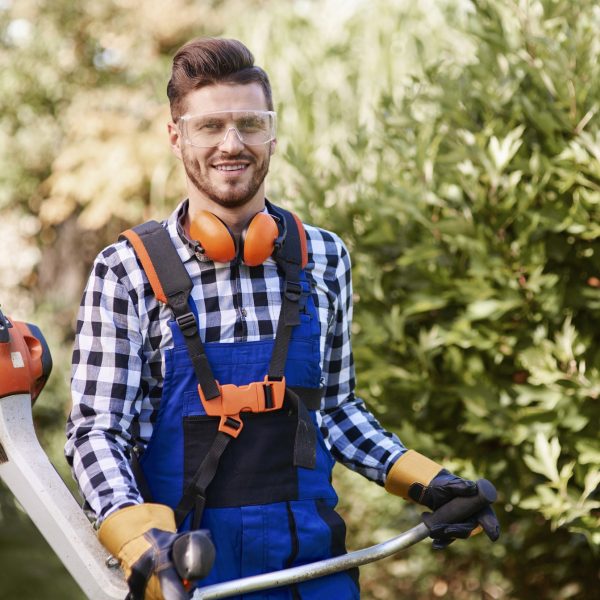 portrait-of-man-working-with-weedwacker.jpg